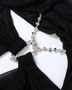 Elettra Ferri halter neck maxi dress with mesh details, flowing fabric, and elegant silhouette for formal occasions.