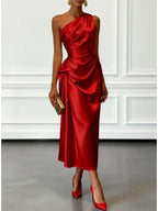 Elettra Ferri satin pleated dress featuring a flowing silhouette and elegant design, suitable for formal or special occasions.