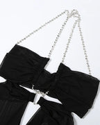 Elettra Ferri halter neck maxi dress with mesh detail, flowing fabric, and elegant design perfect for special occasions.