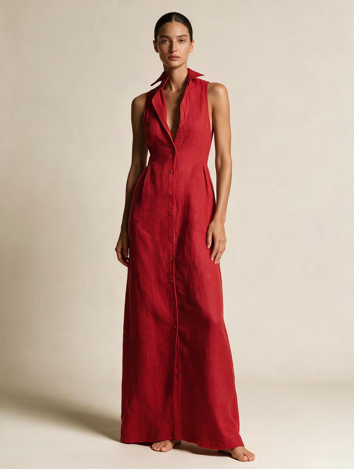 Elettra Ferri Elena V-Neck Sleeveless Maxi Dress on a model, flowing fabric, elegant design, and sleeveless style for summer wear.