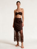 Elettra Ferri brown lace boho party skirt worn by a model, showcasing its flowy design and intricate fabric details.
