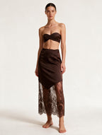 Elettra Ferri brown lace boho party skirt worn by a model, showcasing its flowy design and intricate fabric details.