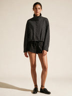Elettra Ferri polka dot casual loose jacket worn by model, lightweight casualwear with relaxed fit and stylish pattern.