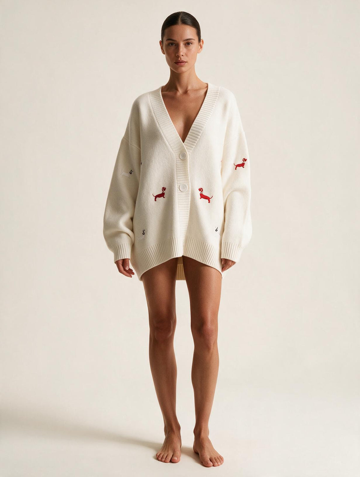 Elettra Ferri embroidered V-neck knit cardigan worn by a model, casualwear with colorful embroidery and a relaxed fit.