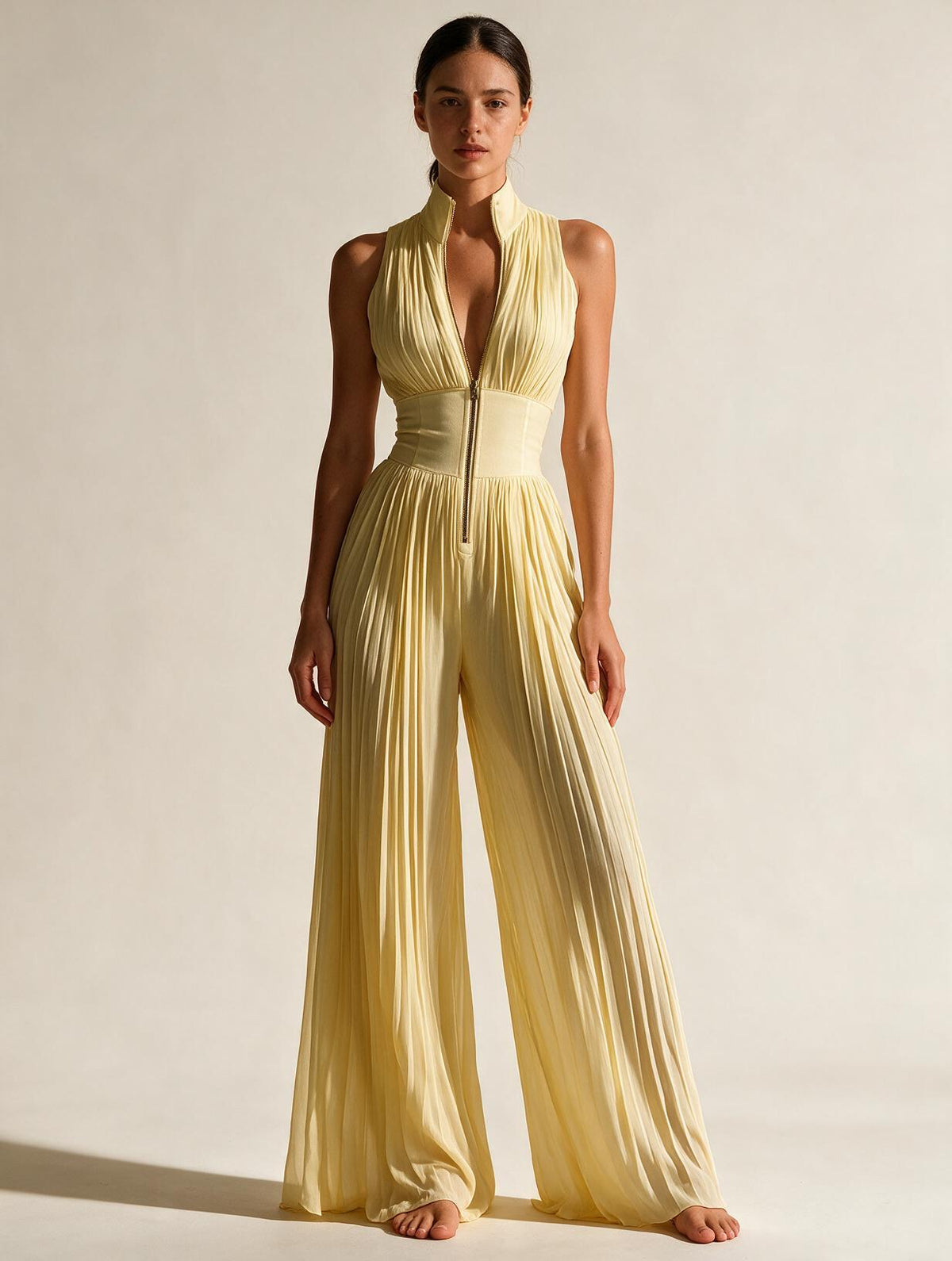 Elettra Ferri pleated wide-leg jumpsuit on a model, showcasing the stylish, flowing design and comfortable fit.