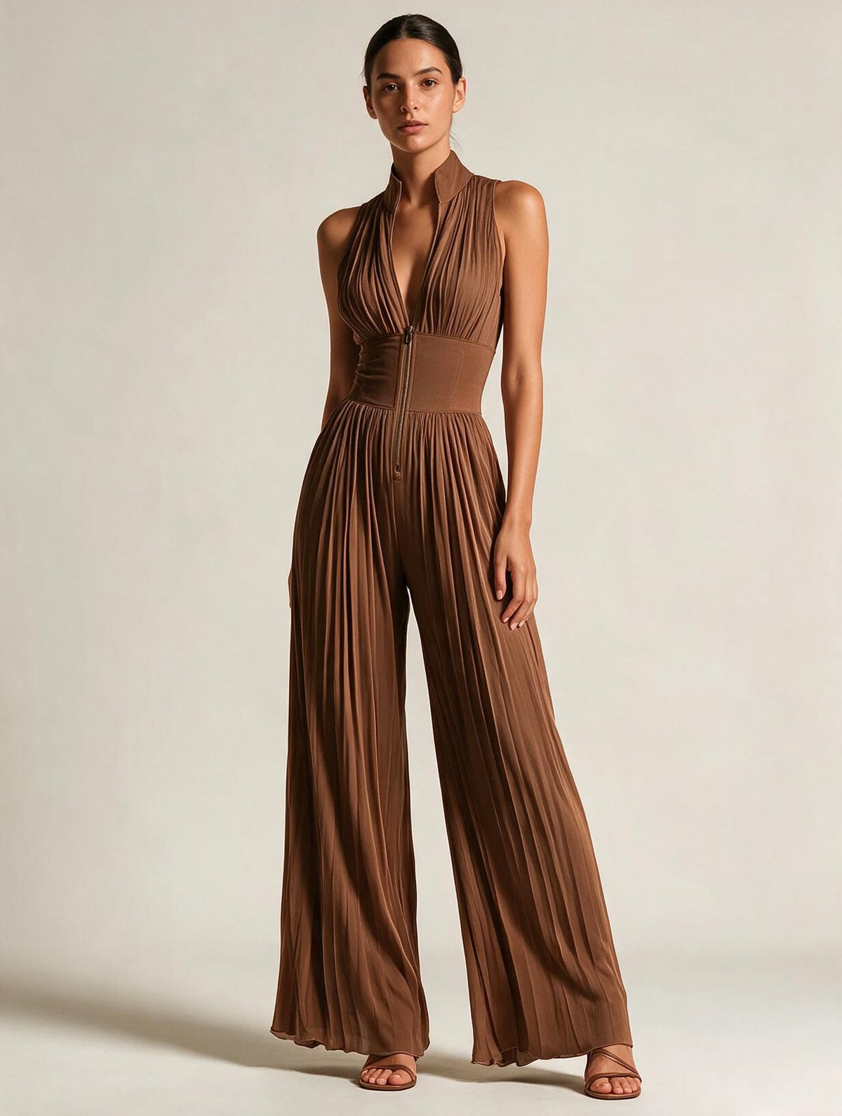 Elettra Ferri pleated wide-leg jumpsuit on a model, showcasing its relaxed fit and stylish design.