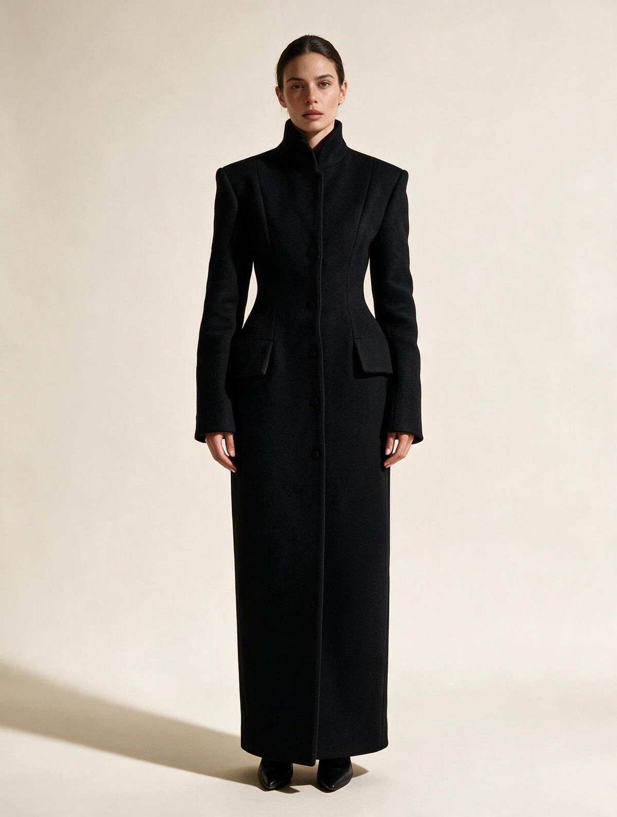 Elettra Ferri elegant waist-cinching wool blend coat worn by a model, showcasing casualwear style and tailored fit.