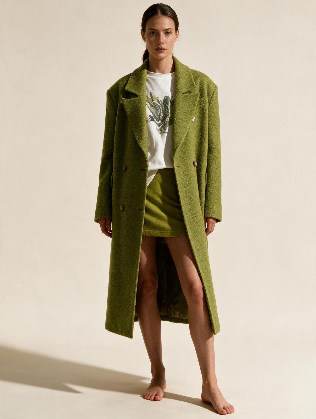 Elettra Ferri long double-breasted wool blend coat on a model, showcasing classic style and tailored fit.