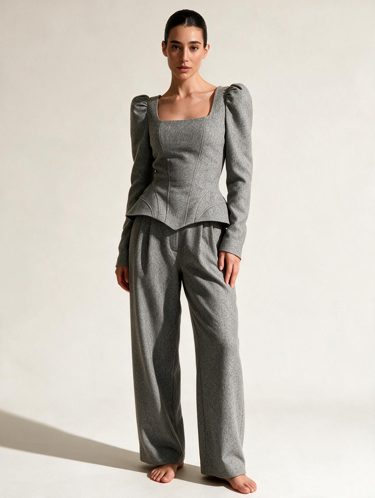 Model wearing Elettra Ferri casual solid-colored wool outerwear set, featuring a cozy jacket and matching pants.