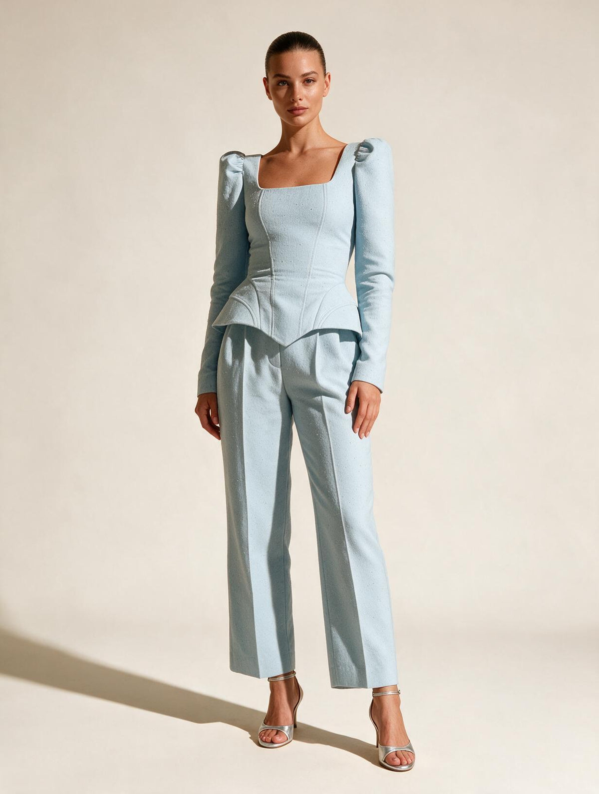 Elettra Ferri casual solid-colored wool outerwear set worn by a model, featuring a cozy jacket and matching trousers.