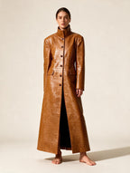 Elettra Ferri long turtleneck single-breasted coat worn by a model, featuring a sleek design and tailored fit.