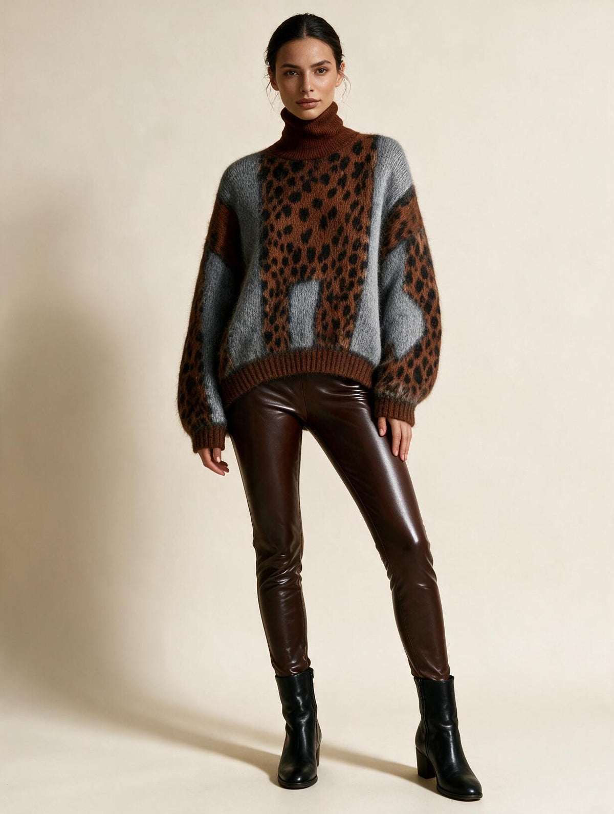 Elettra Ferri premium turtleneck loose-fit sweater worn casually on a model, featuring soft knit fabric and relaxed fit.