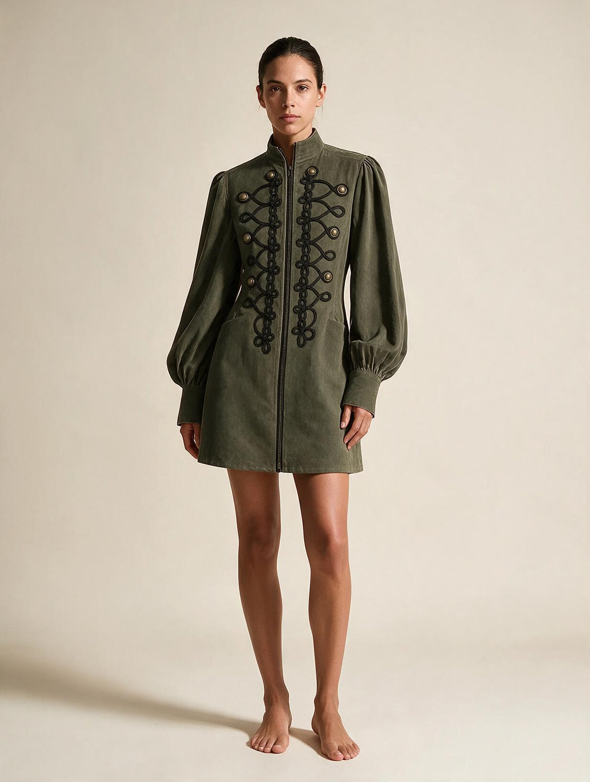 Elettra Ferri vintage high-neck mini dress with lantern sleeves worn by a model, showcasing elegant fashion and detailed design.