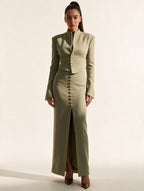 Model wearing Elettra Ferri's premium tailored blazer and midi skirt set, showcasing elegant fabric and stylish fit.