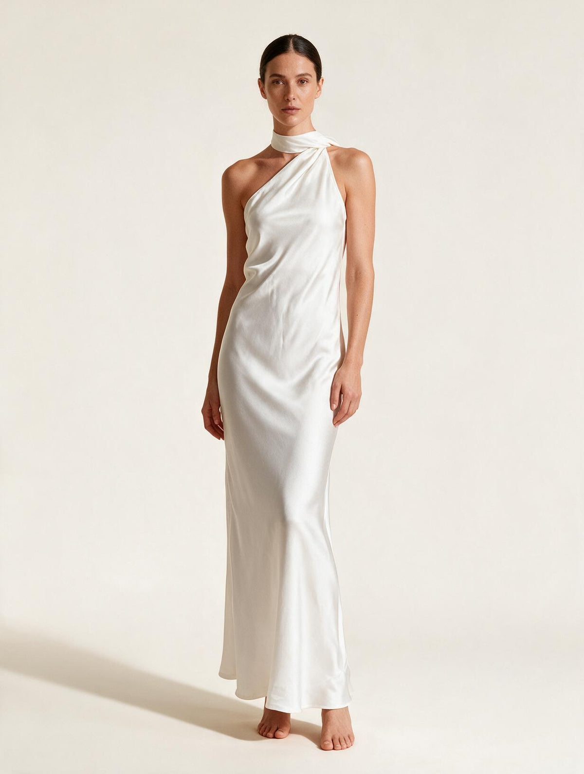 Elettra Ferri halter maxi dress on a model, flowing fabric, elegant design, suitable for summer or formal occasions.