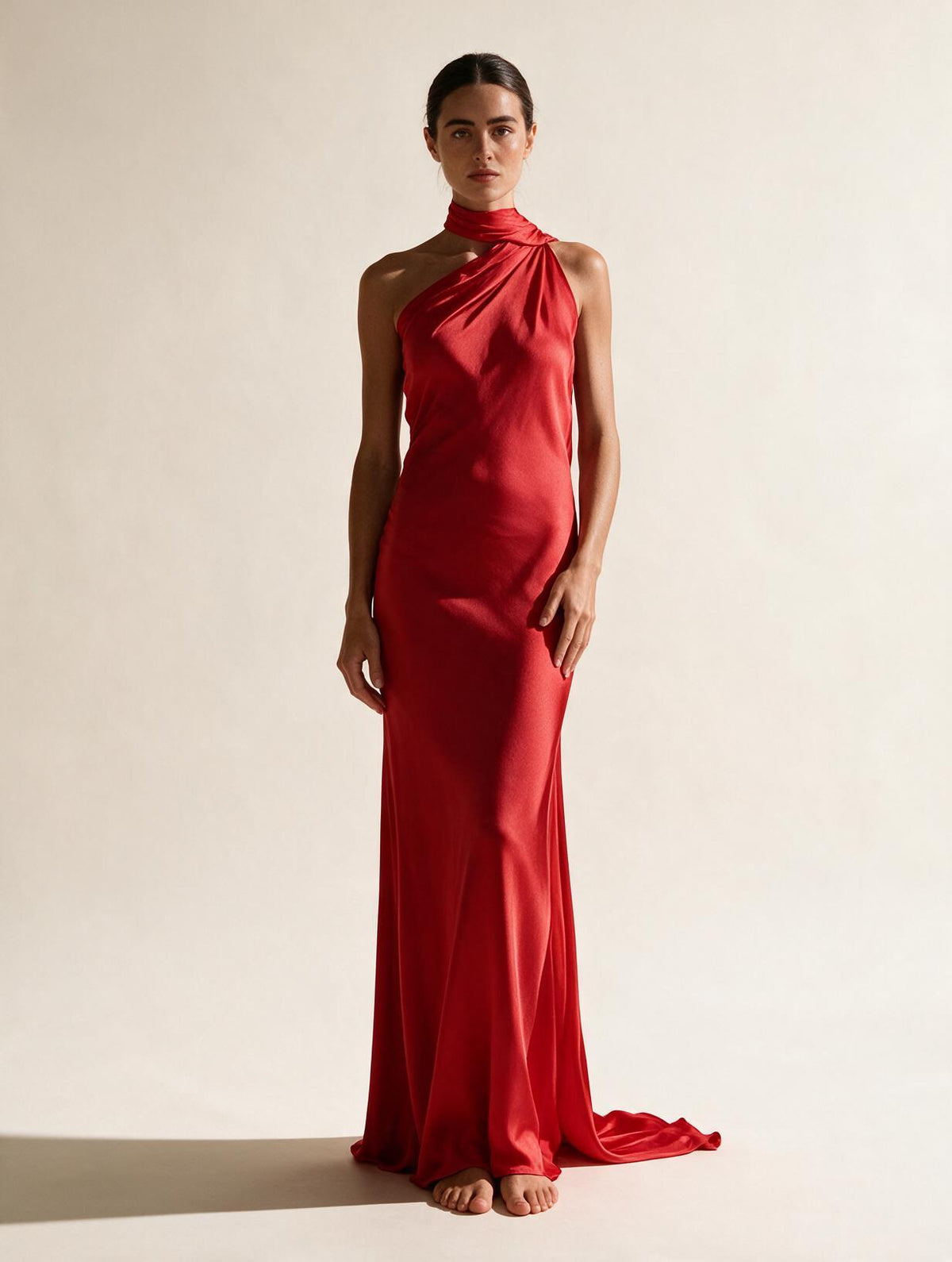 Elettra Ferri halter maxi dress worn by a model, flowing fabric, sleeveless design, elegant and stylish for summer occasions.
