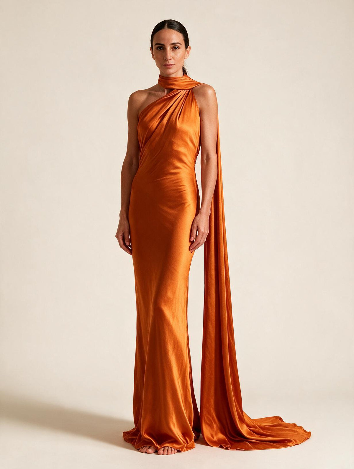 Elettra Ferri halter maxi dress worn by a model, flowing fabric, elegant design, perfect for summer or formal occasions.