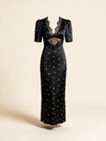 Elettra Ferri Lace Elegance Maxi Dress in flowing lace fabric, showcasing intricate design and floor-length silhouette.
