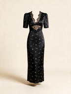 Elettra Ferri Lace Elegance Maxi Dress in flowing lace fabric, showcasing intricate design and floor-length silhouette.