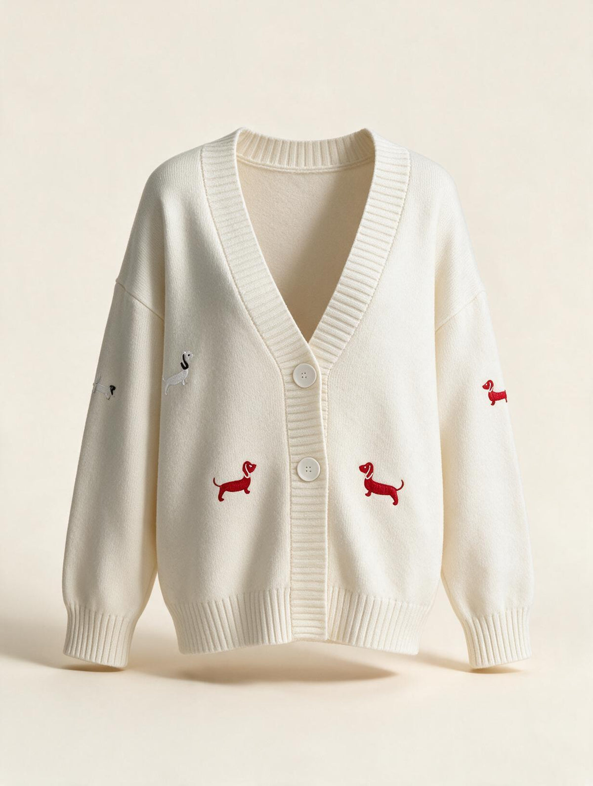 Elettra Ferri embroidered V-neck knit cardigan in soft casualwear, featuring intricate embroidery and a relaxed fit.