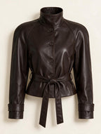 Elettra Ferri structured zip coat in neutral fabric, close-up of front view showing zipper and tailored design.