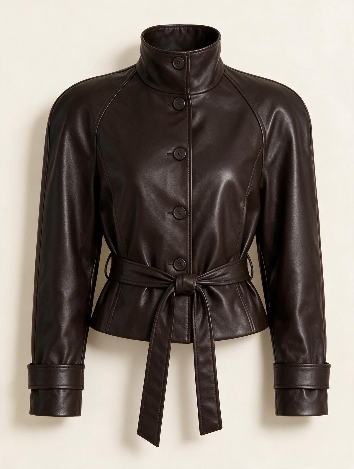 Elettra Ferri structured zip coat in neutral fabric, close-up of front view showing zipper and tailored design.