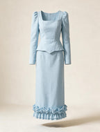 Elettra Ferri casual solid-colored wool outerwear set displayed flat, showing a cozy jacket and matching trousers in neutral tones.