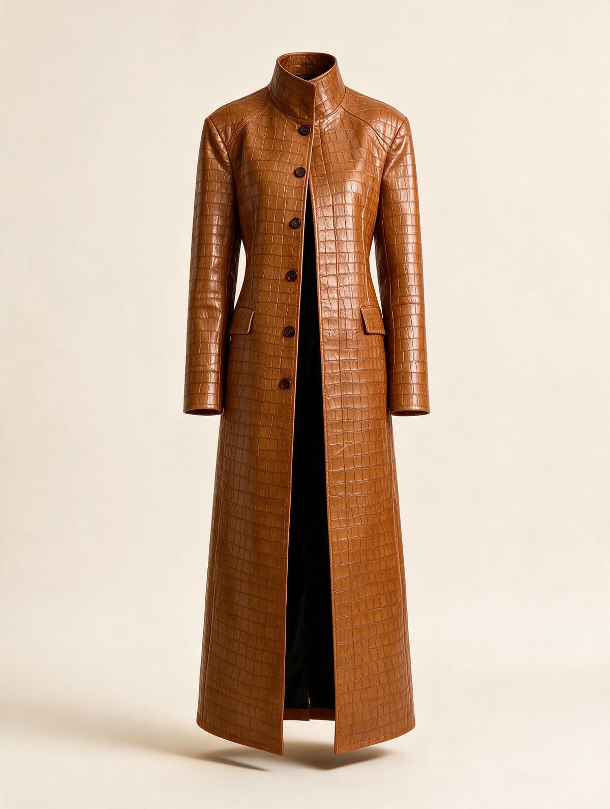 Elettra Ferri long turtleneck single-breasted coat in neutral fabric, displayed hanging on a wooden background.