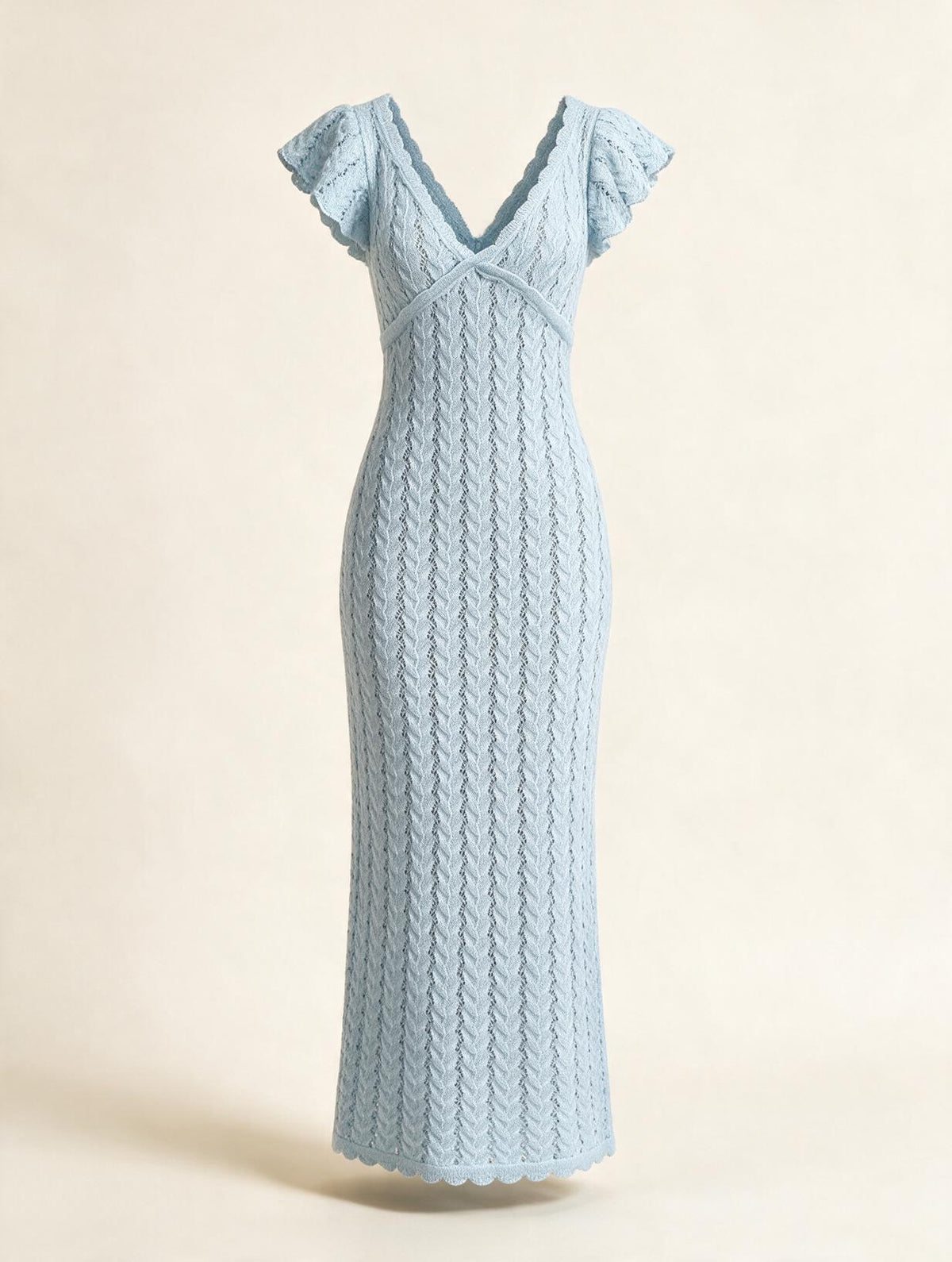 Elettra Ferri V-neck openwork maxi dress in flowing fabric with intricate cutout details, displayed on a hanger.