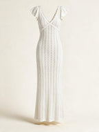 Elettra Ferri V-Neck Openwork Maxi Dress featuring a flowing silhouette and intricate openwork detailing.