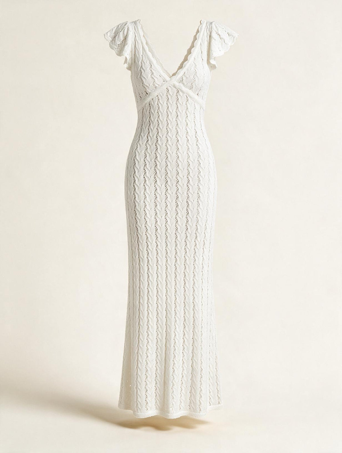 Elettra Ferri V-Neck Openwork Maxi Dress featuring a flowing silhouette and intricate openwork detailing.