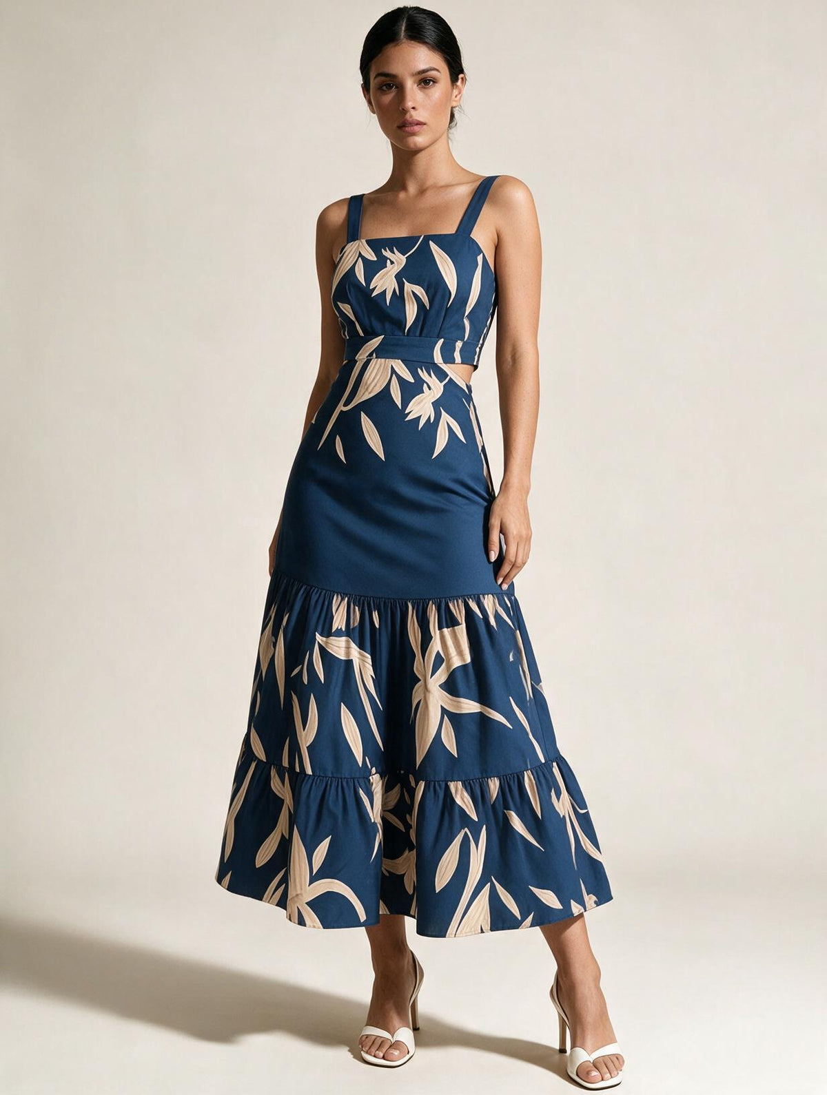 Elettra Ferri printed ruffle A-line midi dress with floral pattern, sleeveless design, and fitted waist on a model.