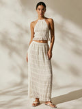 Elettra Ferri bohemian sleeveless summer dress with flowing fabric and floral patterns, perfect for warm-weather casual wear.