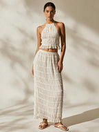 Elettra Ferri bohemian sleeveless summer dress with flowing fabric and floral patterns, perfect for warm-weather casual wear.