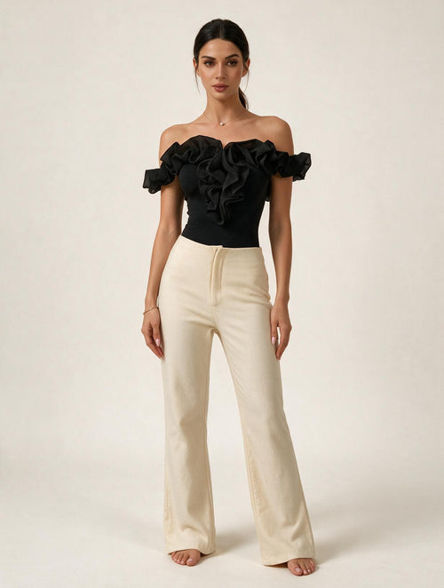 Backless petal sleeve knit top by Elettra Ferri, casualwear, featuring a stylish backless design and delicate petal sleeves.