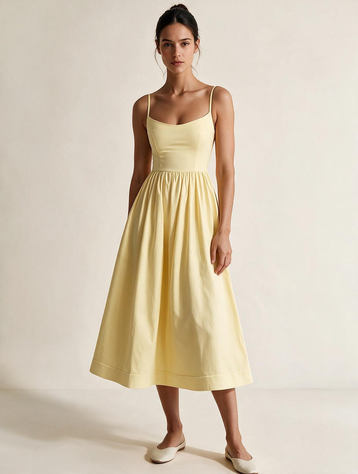 Elettra Ferri ruched maxi dress in flowing fabric, featuring a fitted waist and elegant design, perfect for formal occasions.