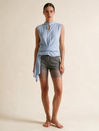Elettra Ferri pleated tank top dress featuring a flowy design and sleeveless style, perfect for casual summer wear.