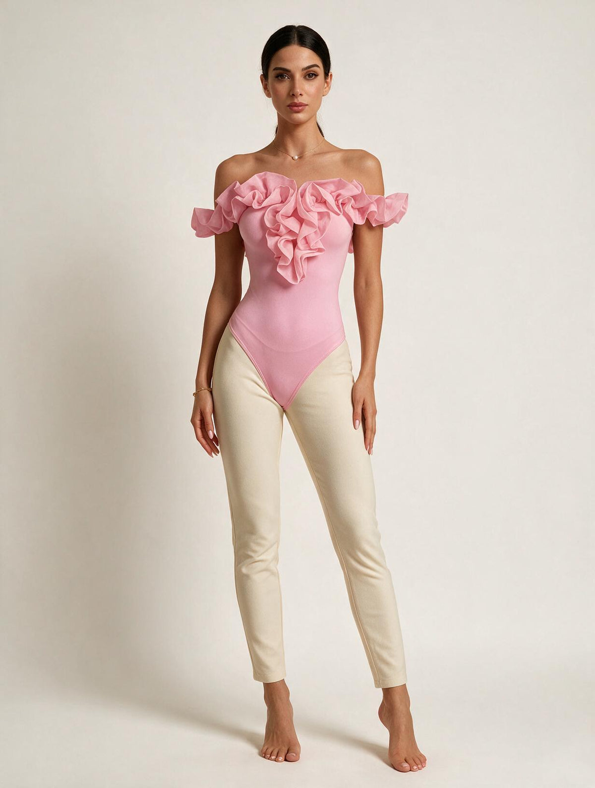 Elettra Ferri backless petal sleeve knit top, casualwear, featuring a stylish backless design and delicate petal sleeves.