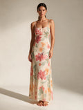 Elettra Ferri floral strapless floor-length maxi dress with flowing fabric and vibrant floral print, perfect for summer occasions.