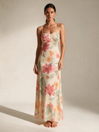 Elettra Ferri floral strapless floor-length maxi dress with flowing fabric and vibrant floral print, perfect for summer occasions.